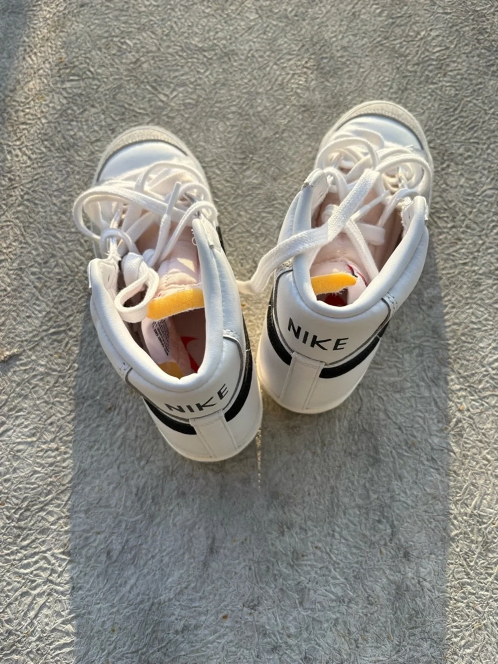 Nike White High-Top Sneakers with Black Swoosh - Picture 4 of 4